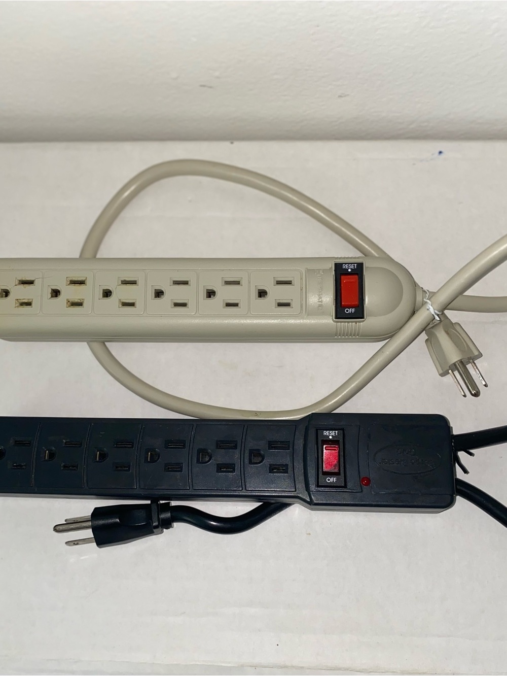 2 Electrical Outlet/Surge Protector Power Strips with Reset Switch.Black & Beige